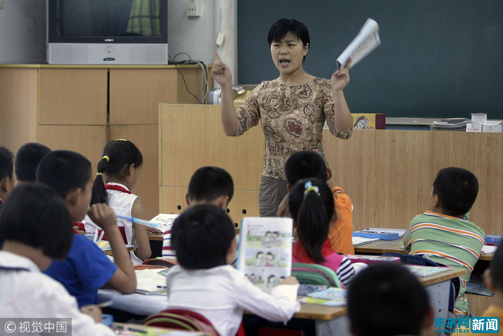 教育部部长:专门出台中小学教师减负政策 不能
